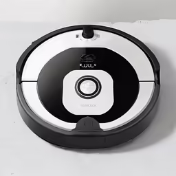 the irobox robot is laying on the floor