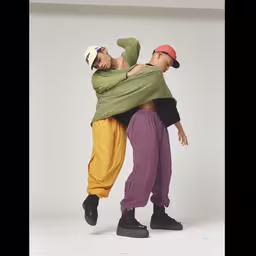 two people holding on to each other while they