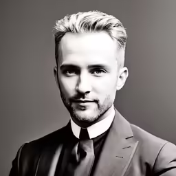black and white image of man with suit and tie