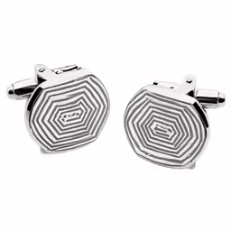 a pair of cuff links with circular design