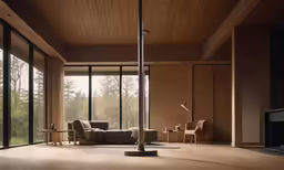 the large room has wooden flooring and sliding glass walls
