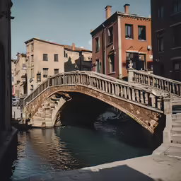 a bridge spanning over a river in the city