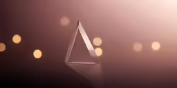 a silver piece on a shiny surface and spotlights