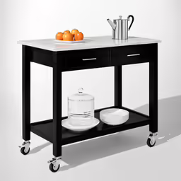 a kitchen cart with a granite top, bowl and two plates