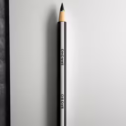 a pencil sitting on top of a blank paper