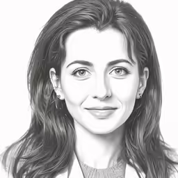 a black and white image of a smiling woman