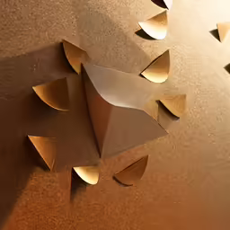 a group of mirrors that are on the wall