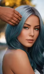 a woman with blue hair with the help of a hand