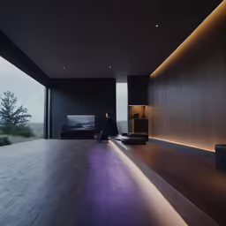 a man sits alone in a dimly lit area