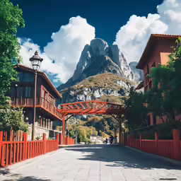 a scenic photo of a mountain and some houses