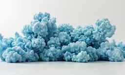 a blue scrunch formation with small bumps on white background