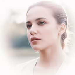woman with blue eyes looking directly to the side