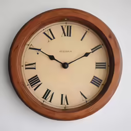 a wooden clock with roman numerals on the face