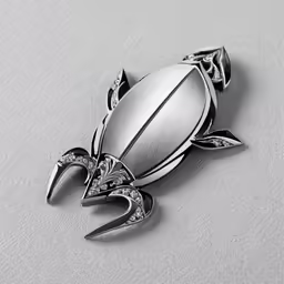 an artisticly designed brooch of a turtle
