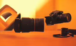 an abstract photograph of a camera with lens attached to the tripod