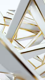 a close up shot of the center of a square, three - dimensional object,the abstract white and gold geometric object