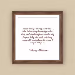 a framed framed wall hanging on the side of a wall,a framed print with an image of a quote