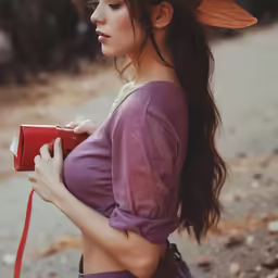 a woman with a floppy hat on her head