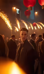 man at party looking in the distance with fireworks