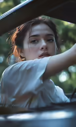 an image of a girl with a wet face looking out a window