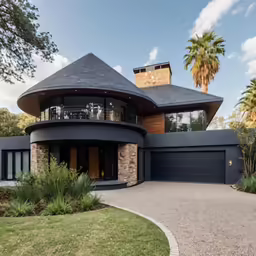 large house with modern architectural features and landscaping