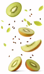 sliced kiwi falling down to the ground