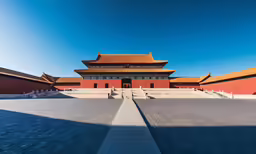 a building that is standing out against the blue sky