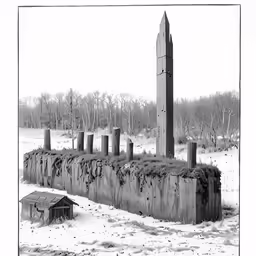 an old photo of a brick structure in the snow