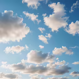 a picture of a very bright blue sky with white clouds