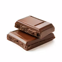 two slices of chocolate with a bite taken out
