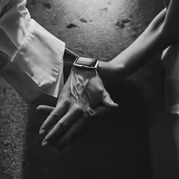 a person is standing with their hand in the air