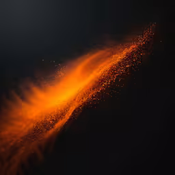 an orange, bright liquid is in the air