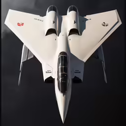 a close up of the underside of a fighter jet in flight