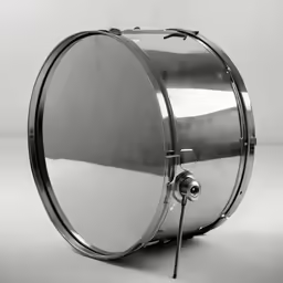large silver drum sits on white background