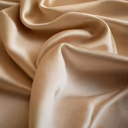 the folds and folds of an tan fabric