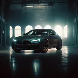 a luxury car parked in a large industrial building