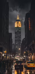some traffic on the road and buildings at night