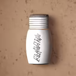 a small white jar with a metal lid attached to it