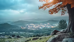an autumn scene with rocks, trees and mountain ranges