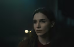 the woman in the dark has long black hair