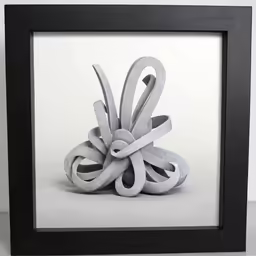 an odd sculpture made from grey material