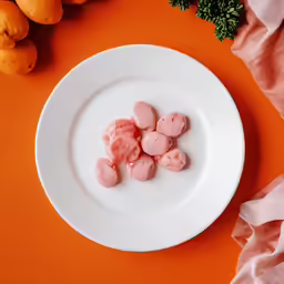 the fruit is sitting on the white plate