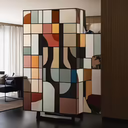 modern art piece in a living room filled with furniture