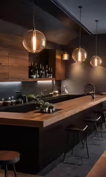 a modern kitchen with dark wood and hanging lights