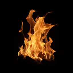 flames glowing against a black background