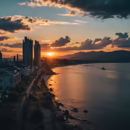 a view of the city and water from an air plane