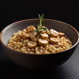 bowl filled with corn with a little leaf on top