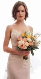 a beautiful bride holding a bunch of flowers