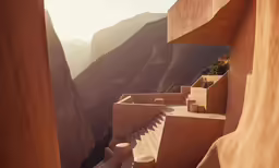 stairs lead up to some steep cliffs in the mountains