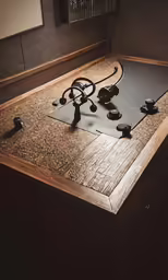 a stove with a wooden counter top under it